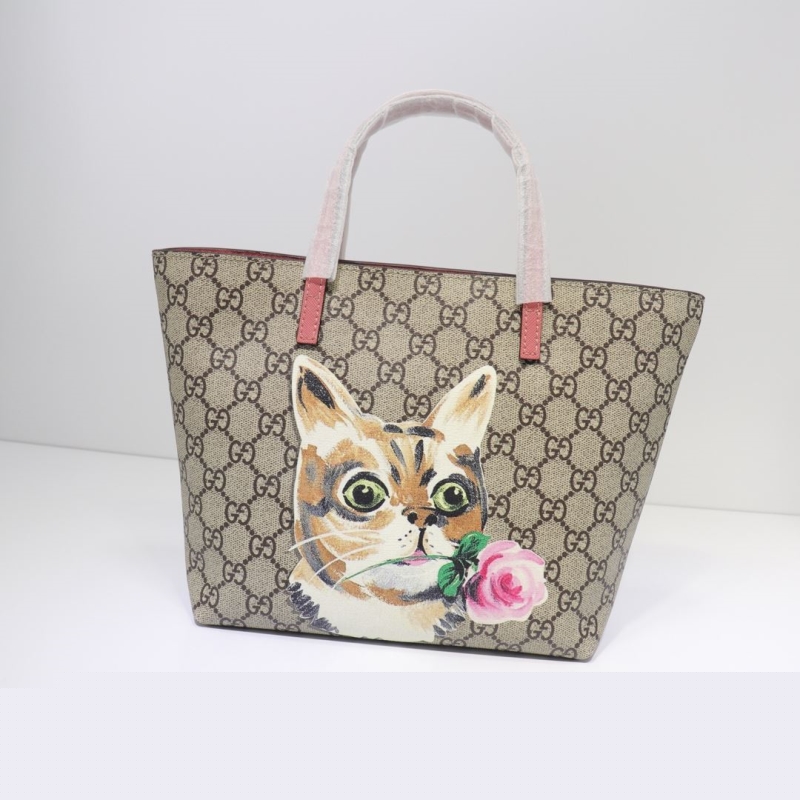 G*u*i shopping bags